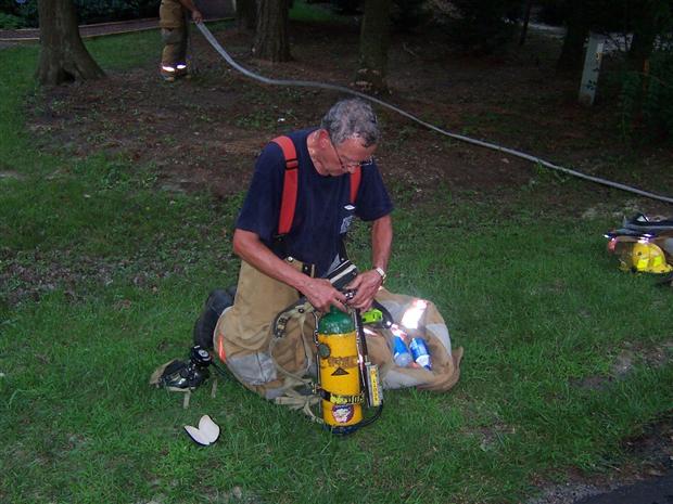 Fireman cleans up