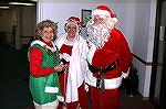 MSO Symphony Society president Andrea Barnes poses with Santa and Mrs. Claus better known around the community as Carol and Al Kastner at the 2006 Mid Atlantic Symphony Orchestra Christmas Concert hel