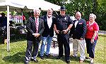 Memorial Day 2024. Posing for an image (left to right) are Worcester County Commissioner Chip Bertino. OPA president Rick Farr, OPA Chief of Police Tim Robinson, and Veterans Memorial Foundation presi
